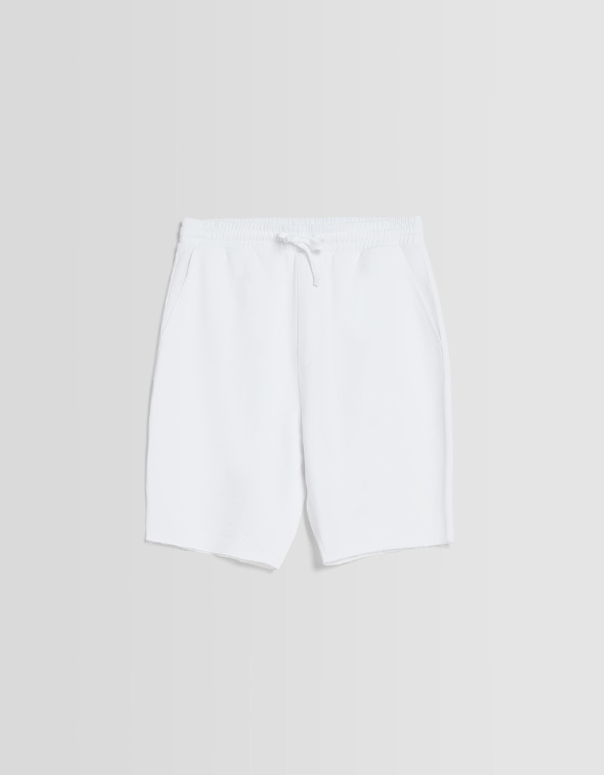 Bermudas de pelúcia com efeito desbotado