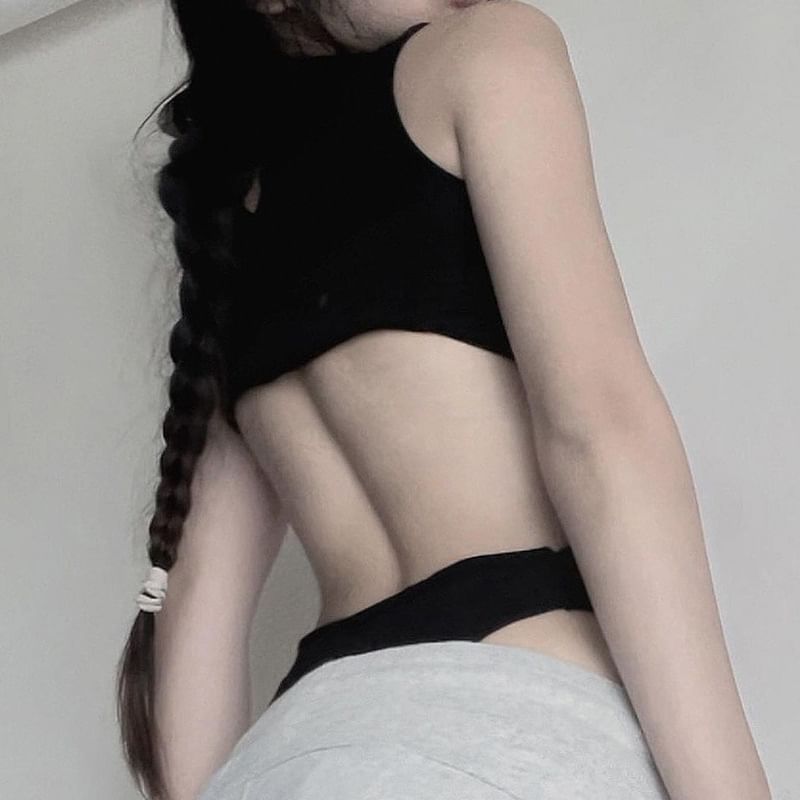 BrickBlack - Mouwloos bodysuit met ronde hals en uitsparingen