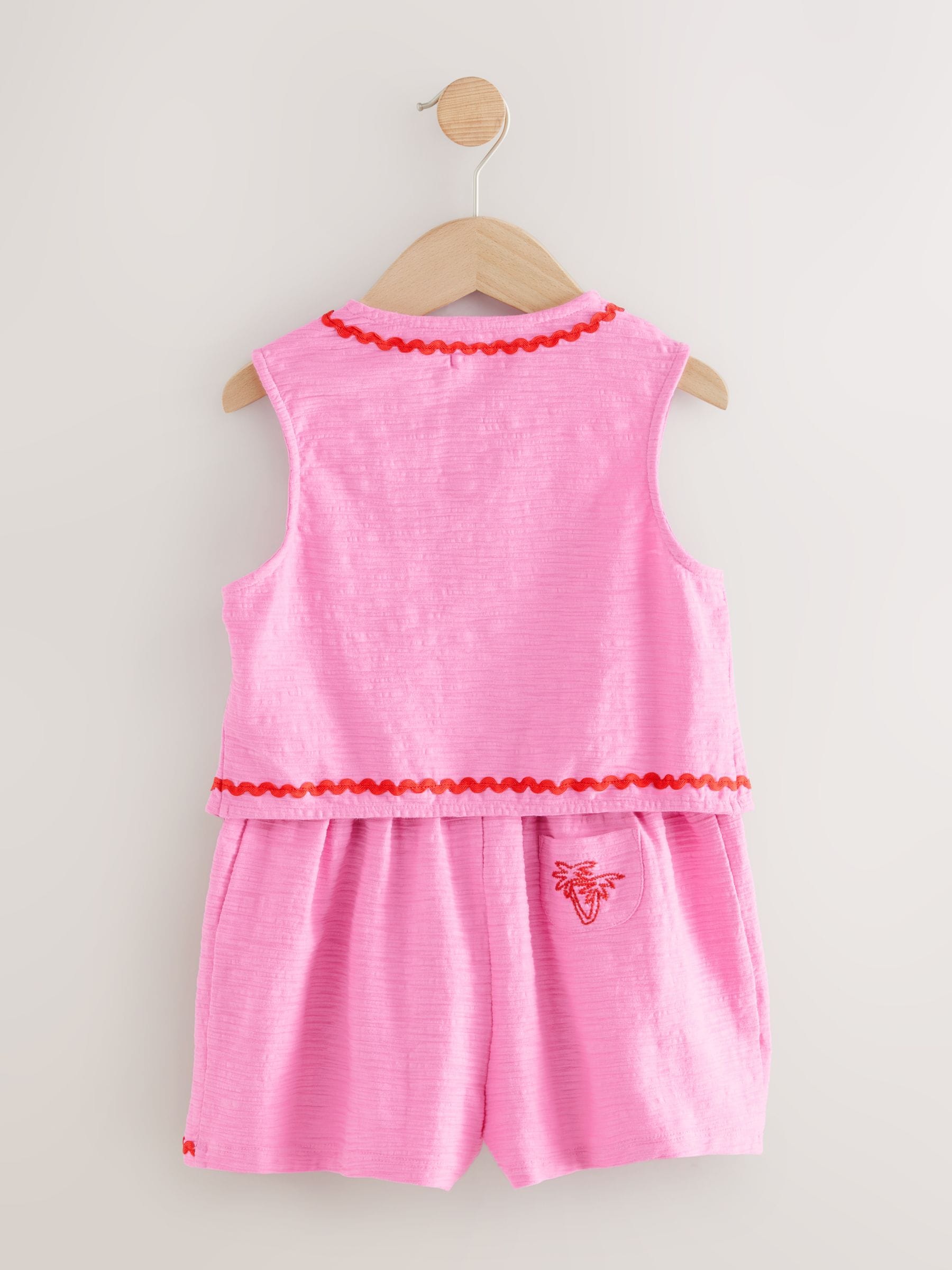 Roze - Geborduurde gilet- en shortset (3-16jr)