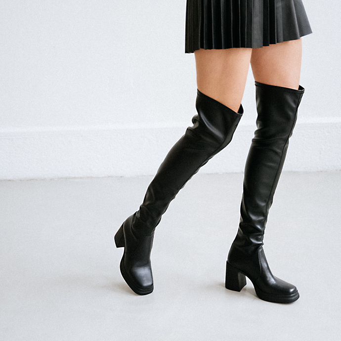 Bottes à plateformes et bouts carrés  en cuir et stretch noir