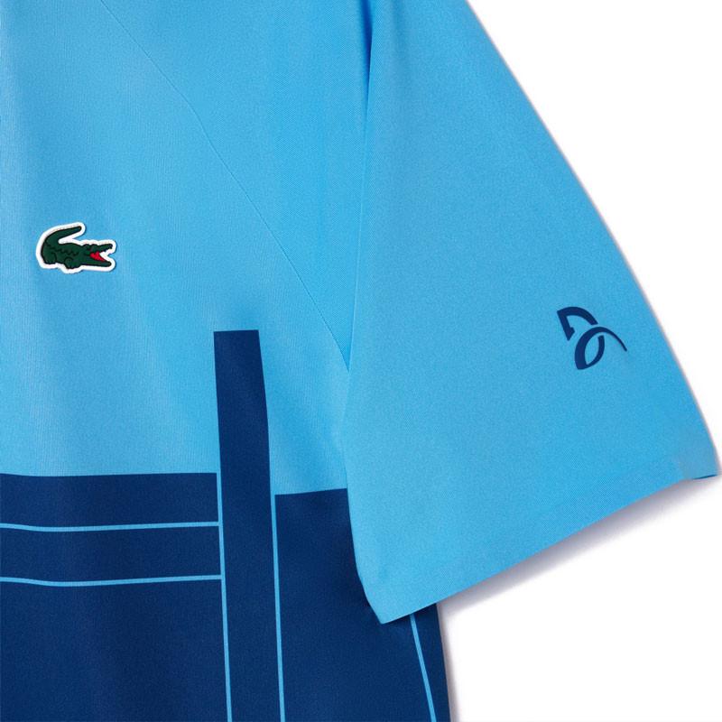 Polo tennis Lacoste Djokovic US Open bleu
