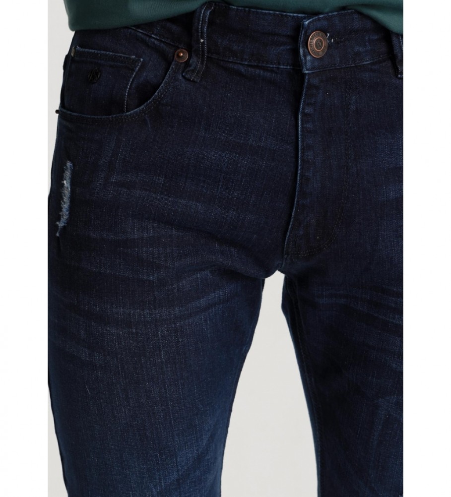 Calça jeans azul-escura rasgada da Six Valves