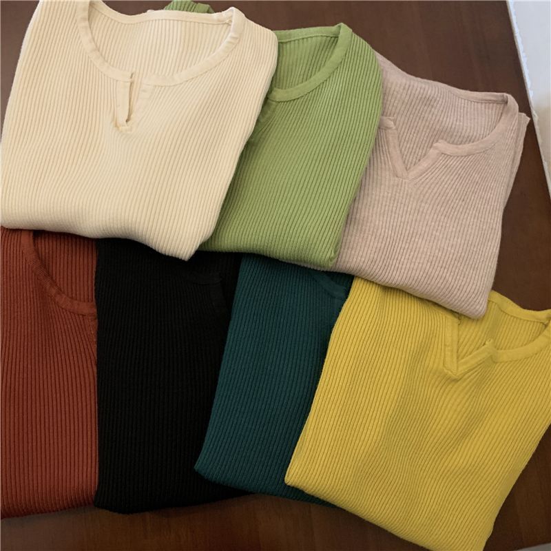 Closette - Gebreide top met lange mouwen en open knoopsluiting