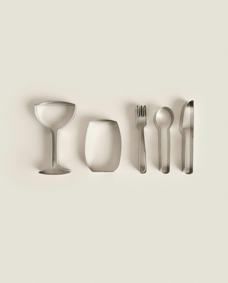 Conjunto de moldes de aço em formato de utensílios de mesa