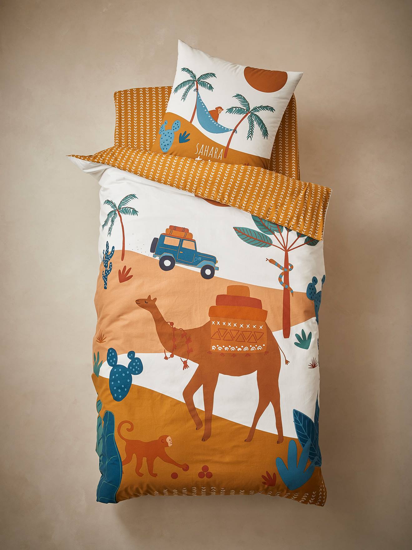 Conjunto infantil Wild Sahara com capa de edredom e fronha, marrom médio, liso com estampas.