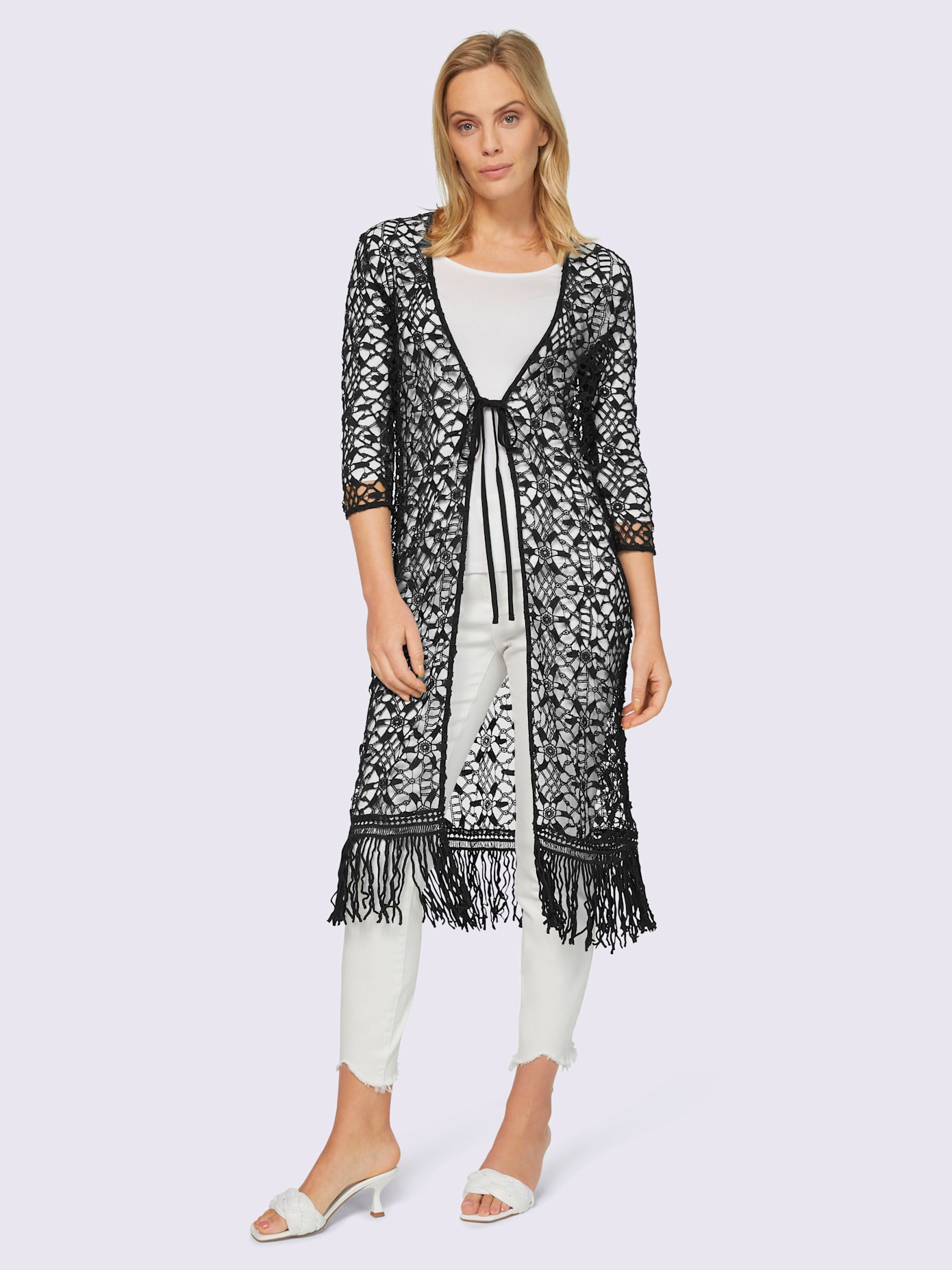 Manteau en tricot aspect crochet