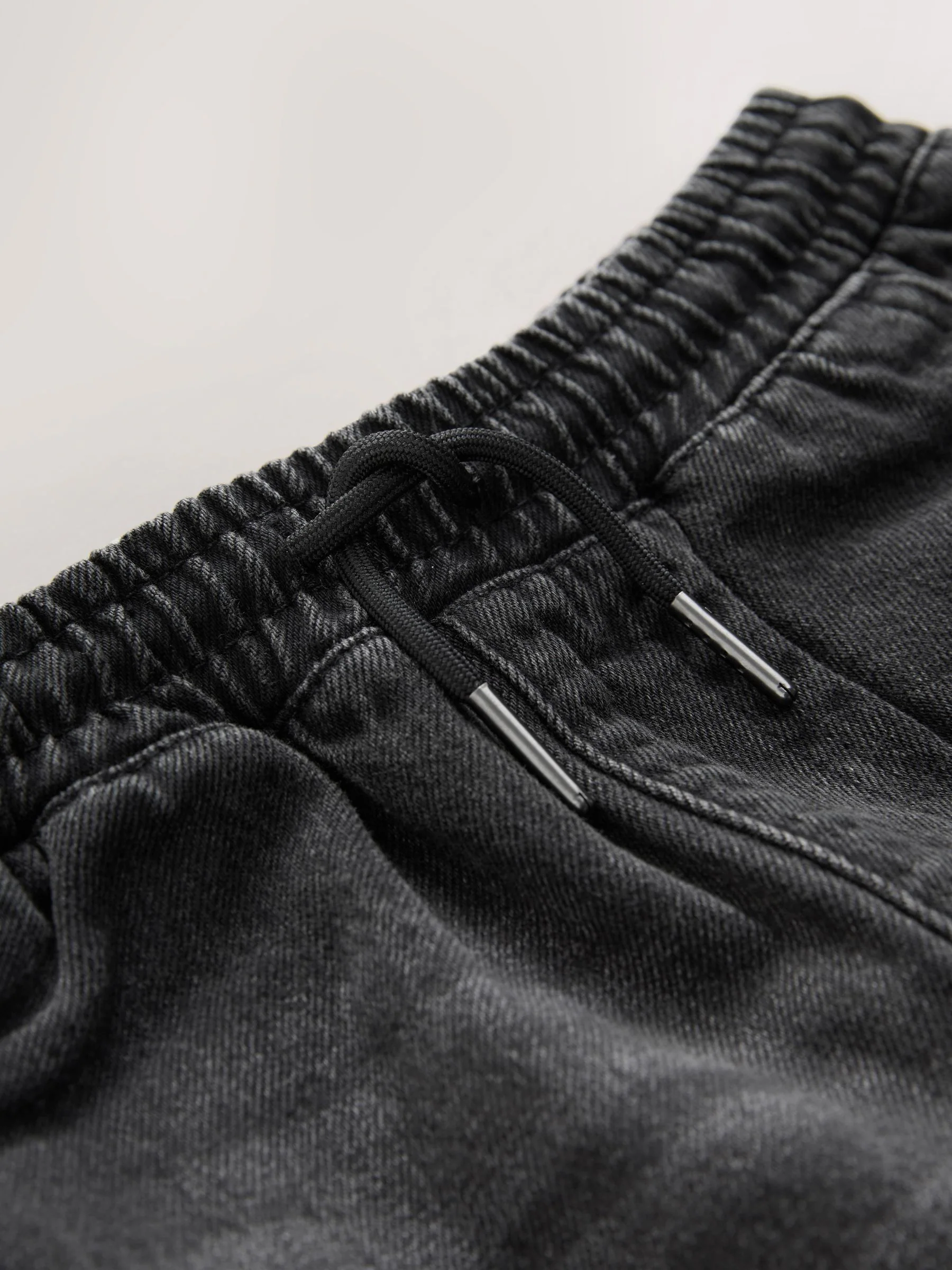 Zwarte wassing - Denim jeans met elastische taille (3-16jr)
