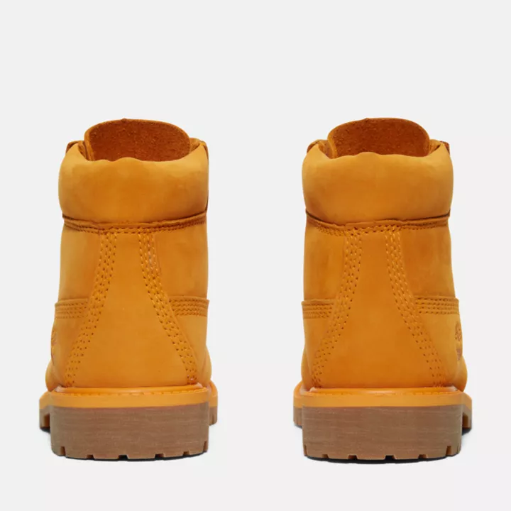 Bota Timberland Premium de 6 polegadas, impermeável, edição 50, para crianças pequenas, na cor laranja.