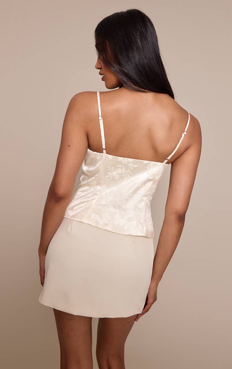 Crème Corset À Agrafes Avec Motif Floral En Relief