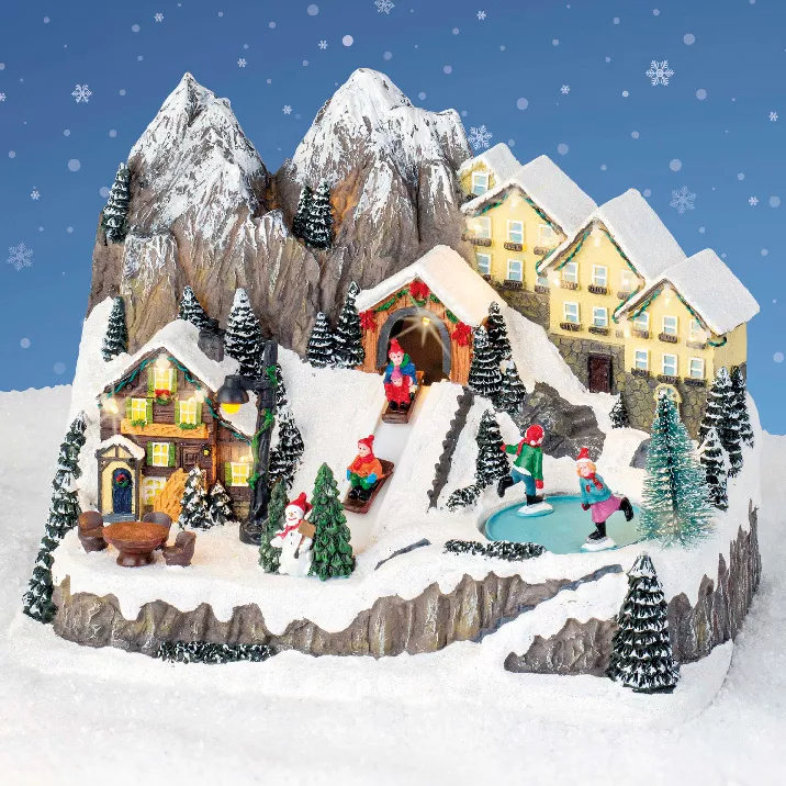 Village de Noël lumineux et musical Chalets en montagne