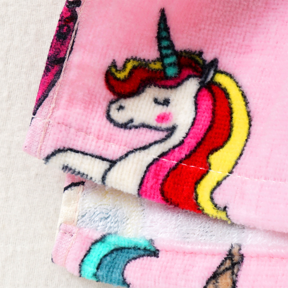 Topolino Badeponcho mit Einhorn-Motiven rosa