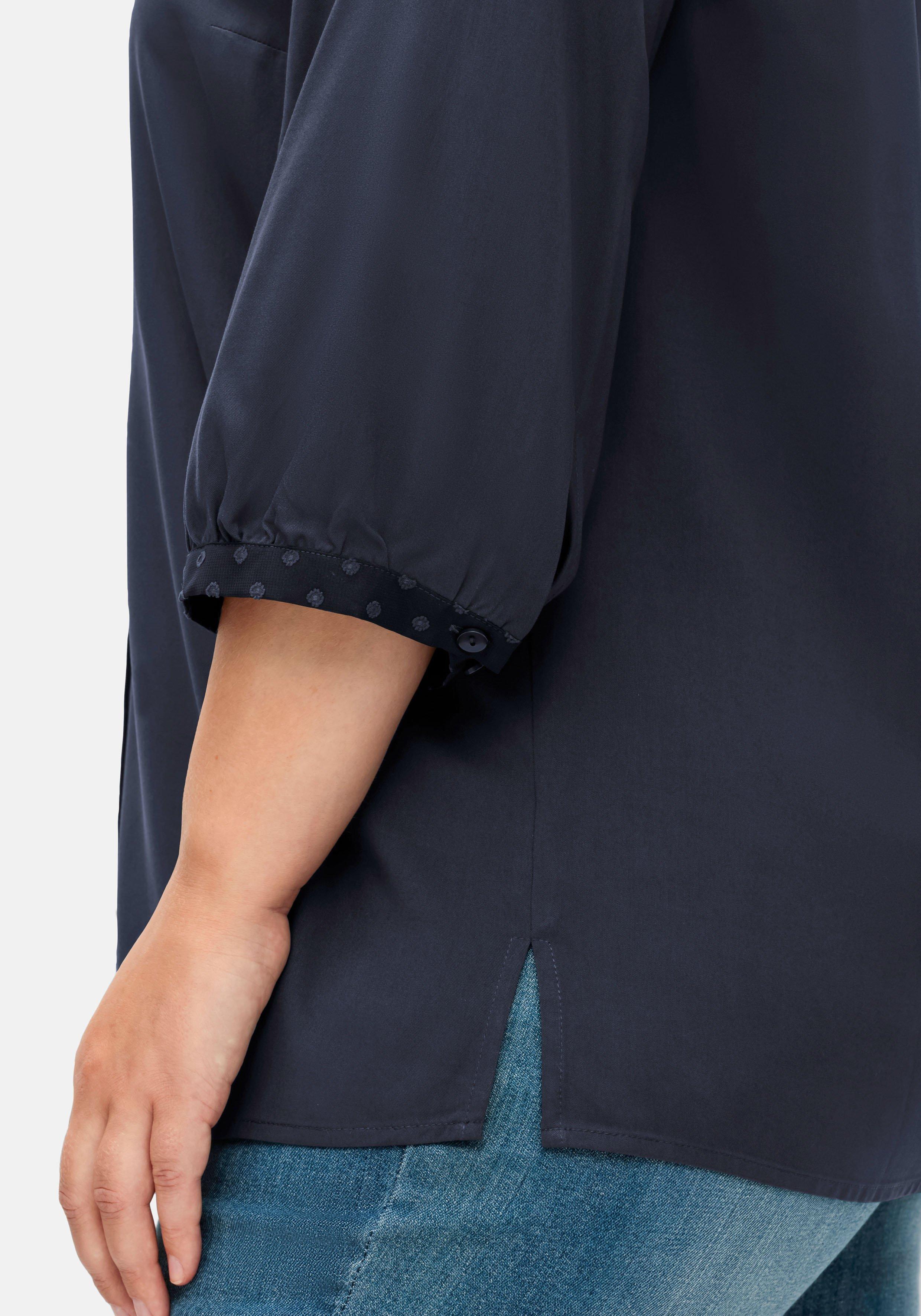 Bluse mit Chiffonpasse und Häkeldetails