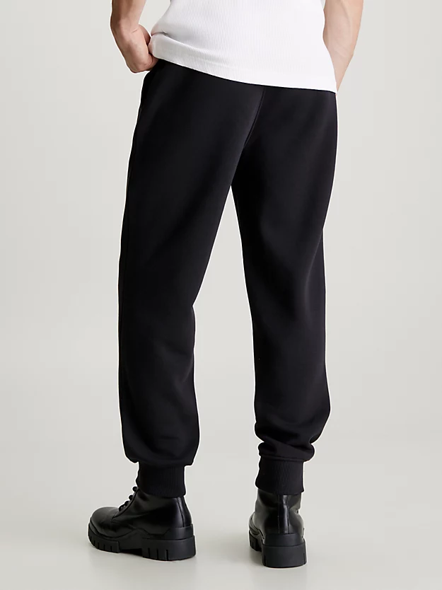 shorts de moletom com monograma