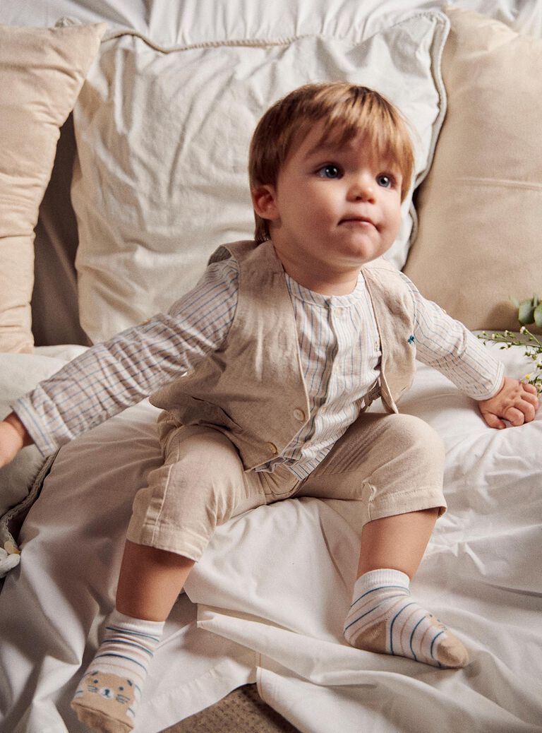 Veste beige sans manches en lin