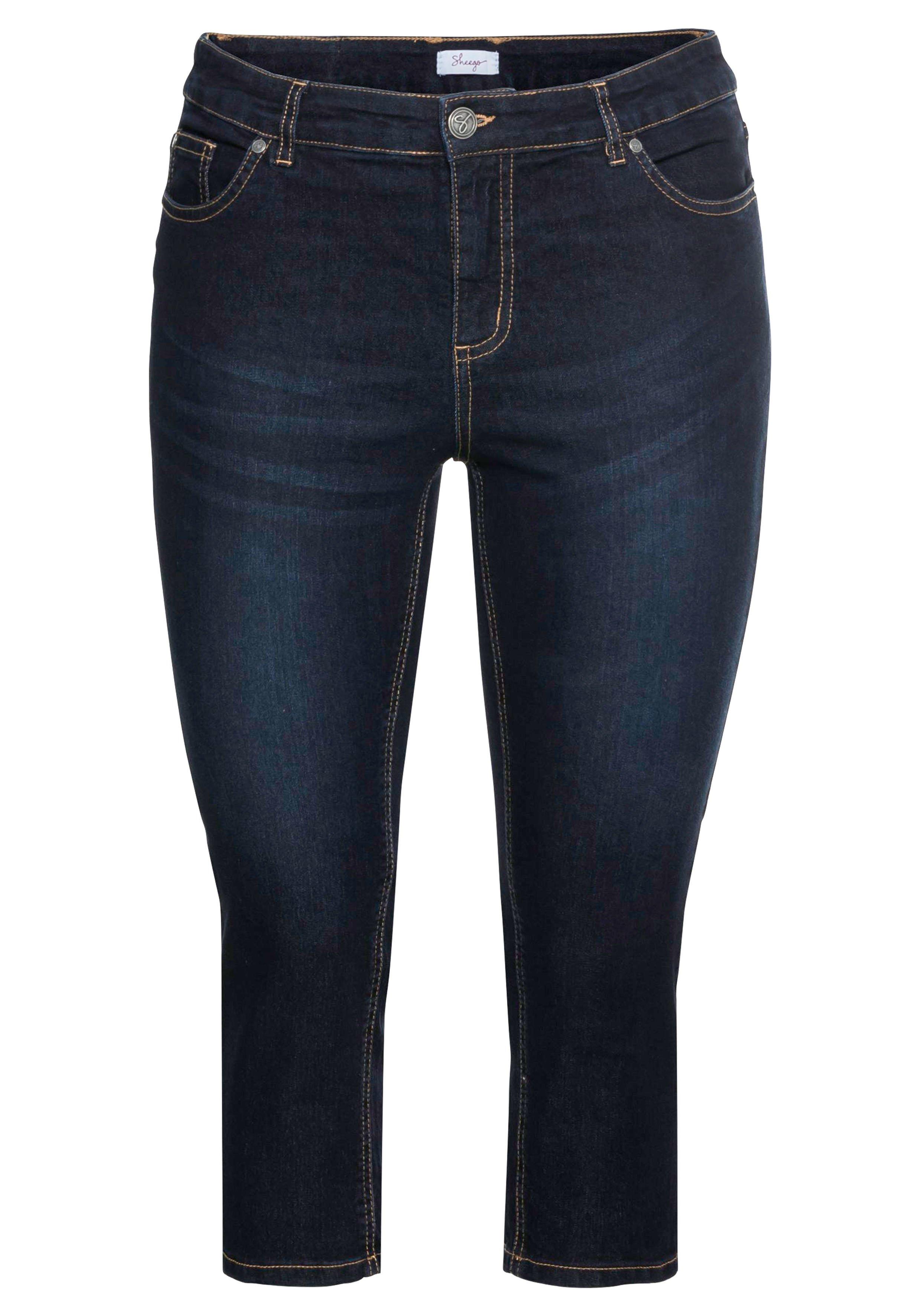 Caprijeans mit Kontrastnähten und Catfaces