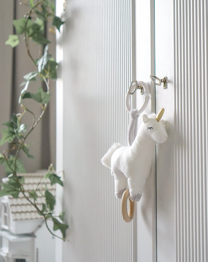 Spieluhr EINHORN mit Befestigungsring in weiß