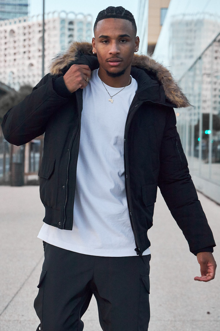 Parka bi-matière noire à capuche en fourrure