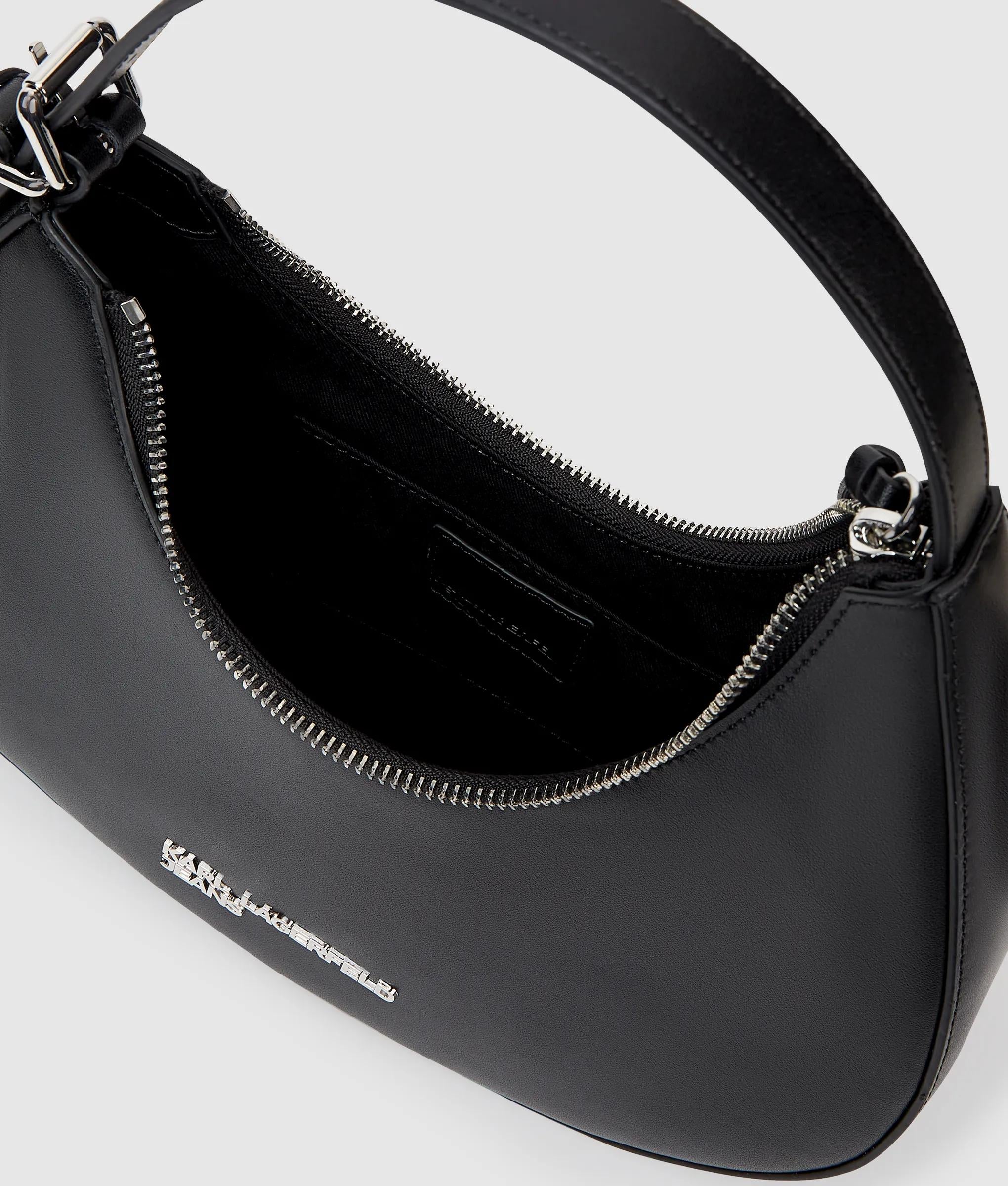 Tas met ronde, leren handgreep