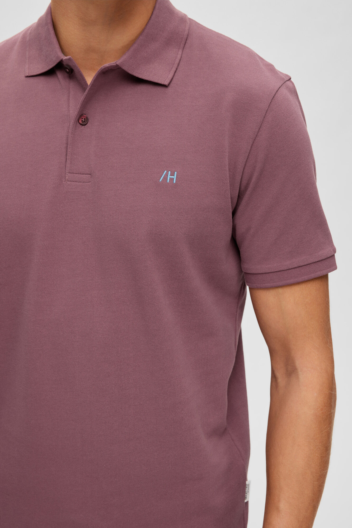 Polo de algodão orgânico com logotipo bordado - Rosa