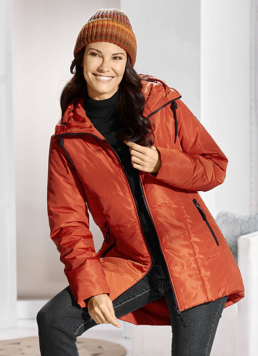 Longjacke mit umschlagbarem Regenschild