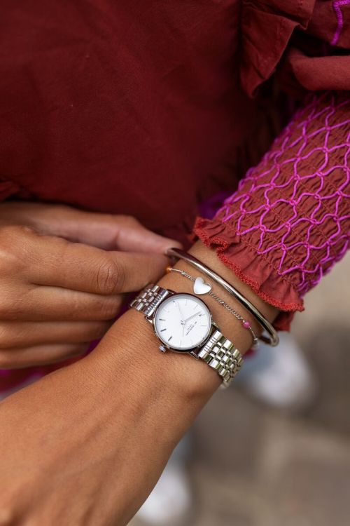 Rond horloge met kleine witte wijzerplaat