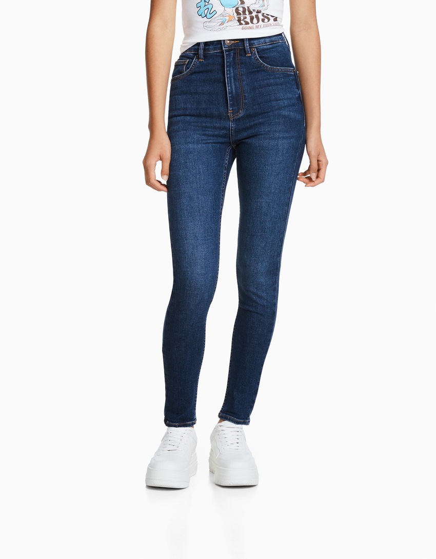 calça jeans skinny de cintura super alta