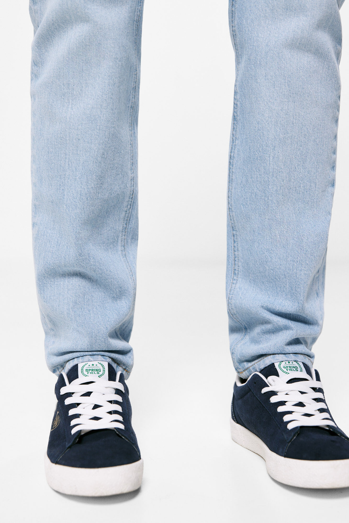 calça jeans slim de lavagem clara