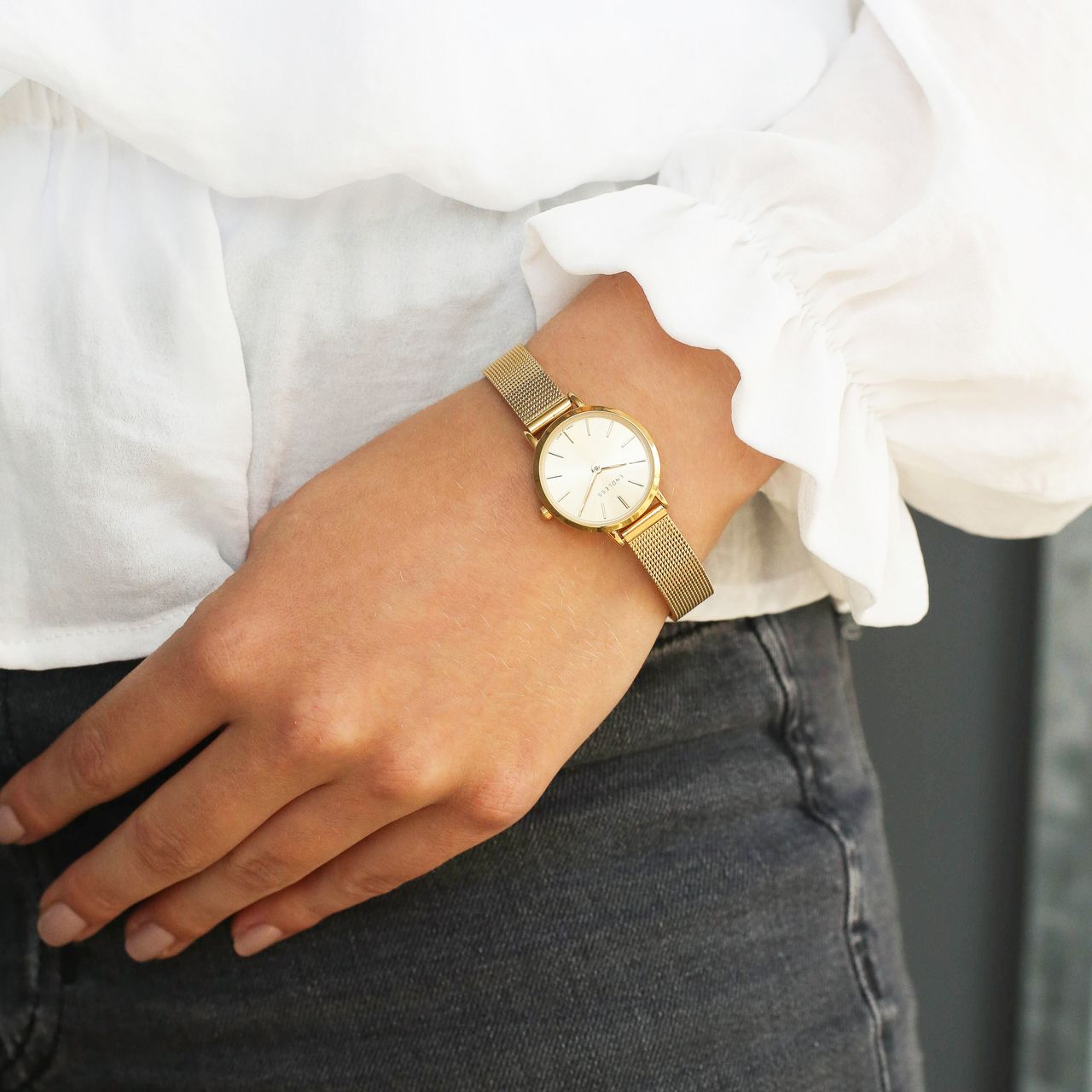 Endless horloge met goudkleurige mesh band