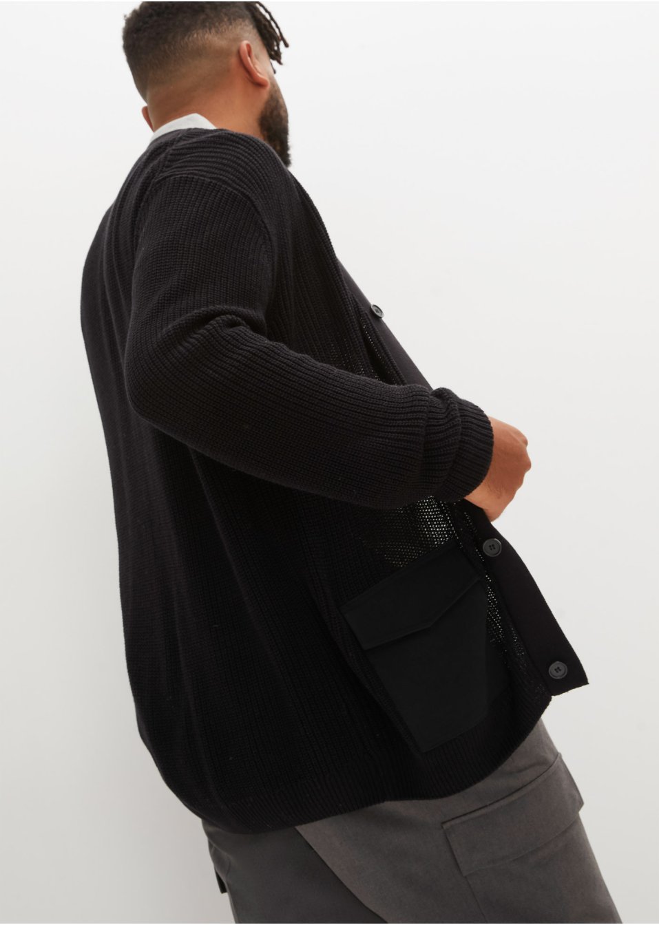 Gilet en maille avec poches tissées