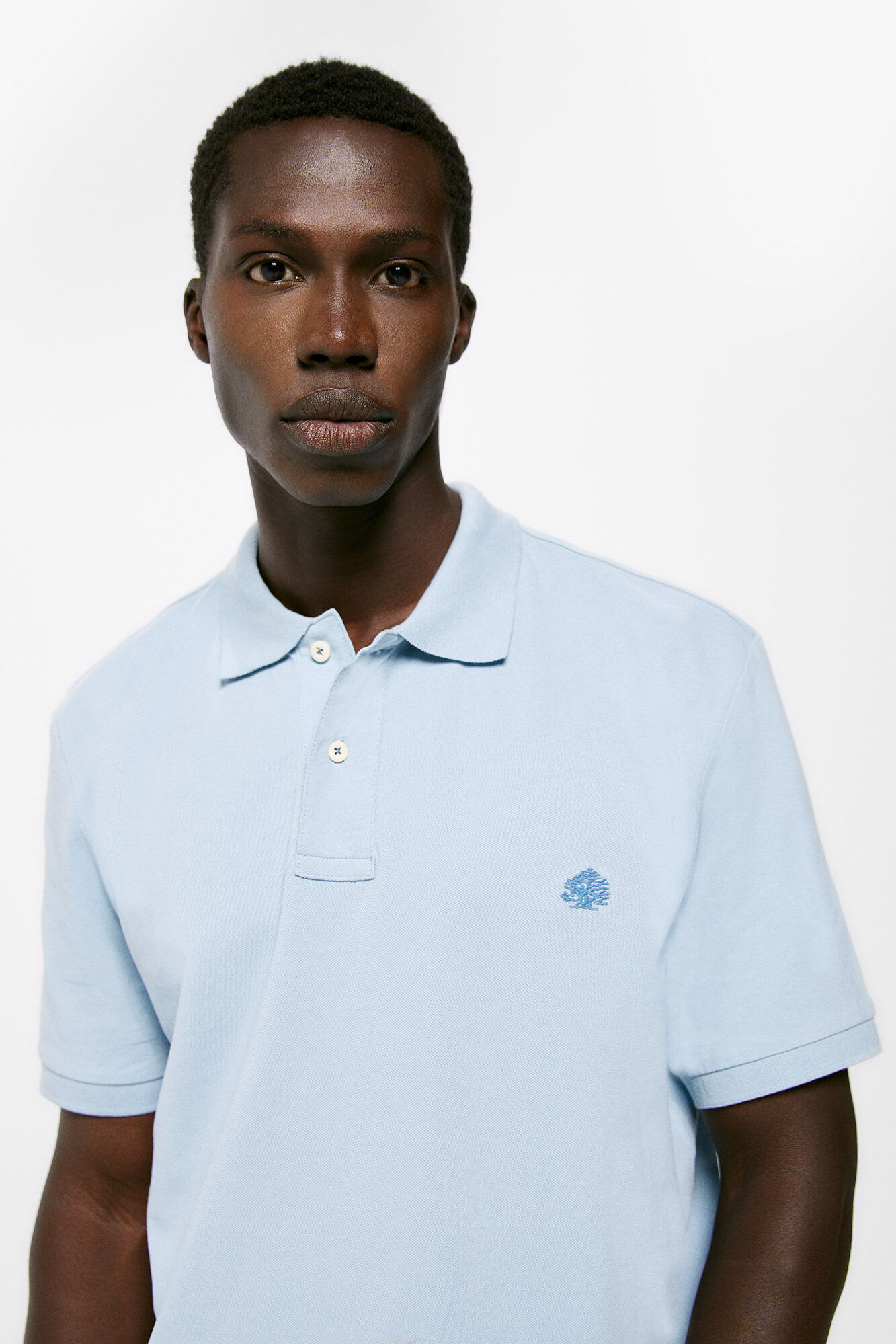 Camisa polo básica em piqué - azul claro