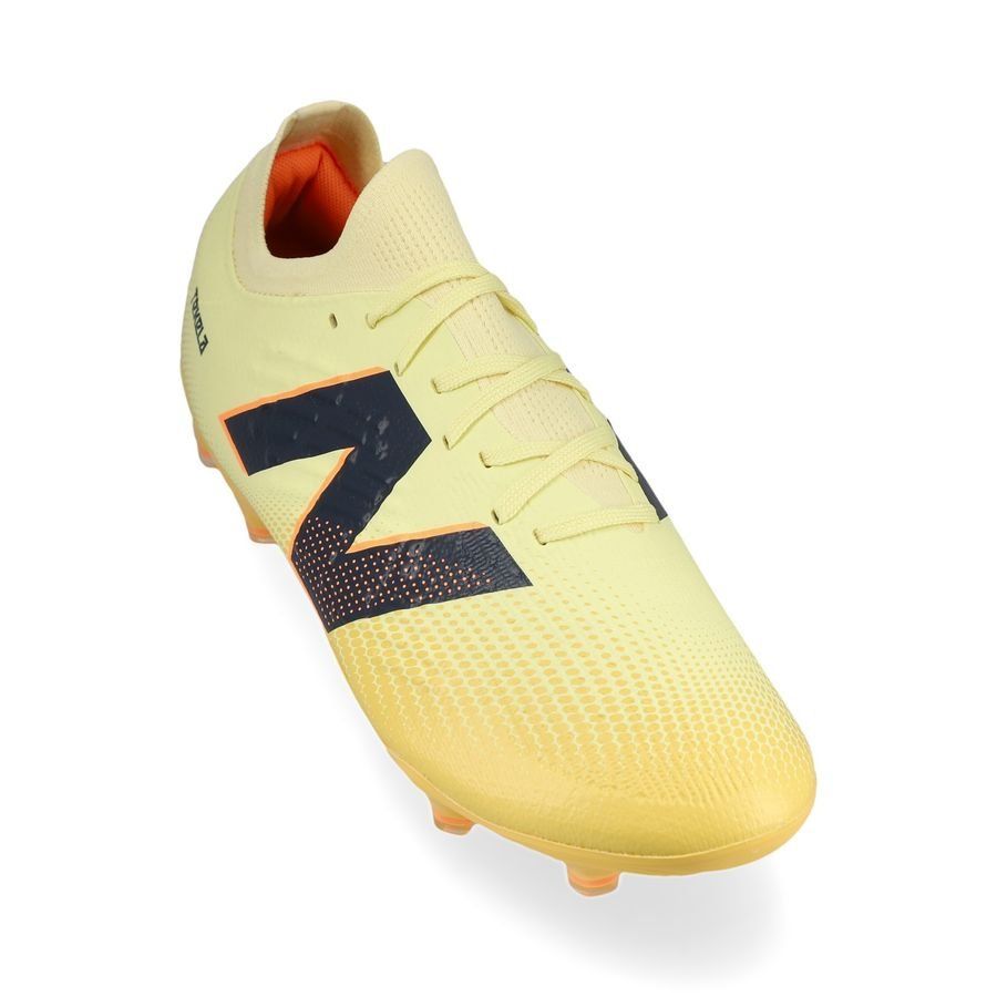New Balance Tekela V4 Magia Low FG Energy Rush - Parchment/Noir/Orange