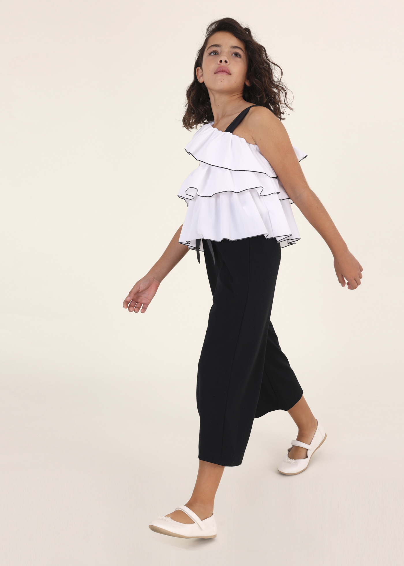 Calças cropped com amarração em malha Roma para meninas