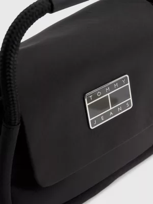 Bolsa transversal com aba e emblema