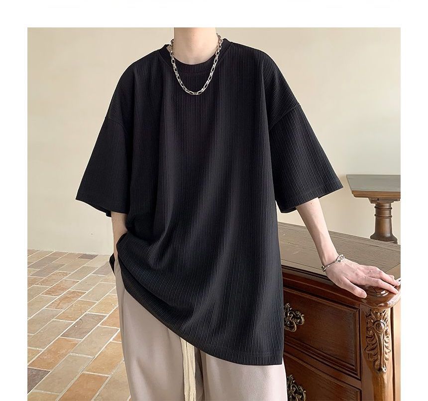 Nightbell - Effen oversized T-shirt met ronde hals en elleboogmouwen