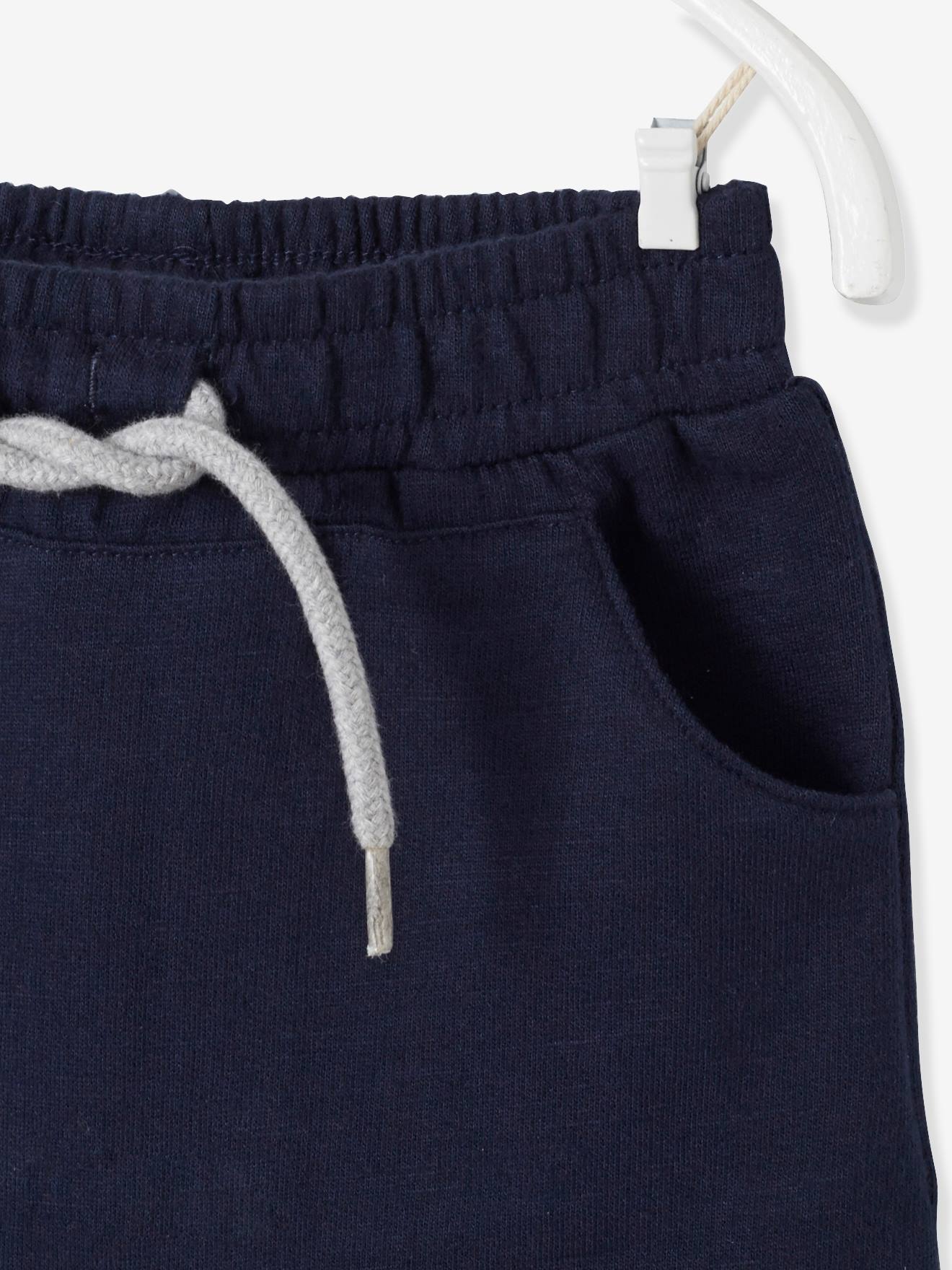 Bermuda de lã polar para bebê menino. Azul escuro liso.