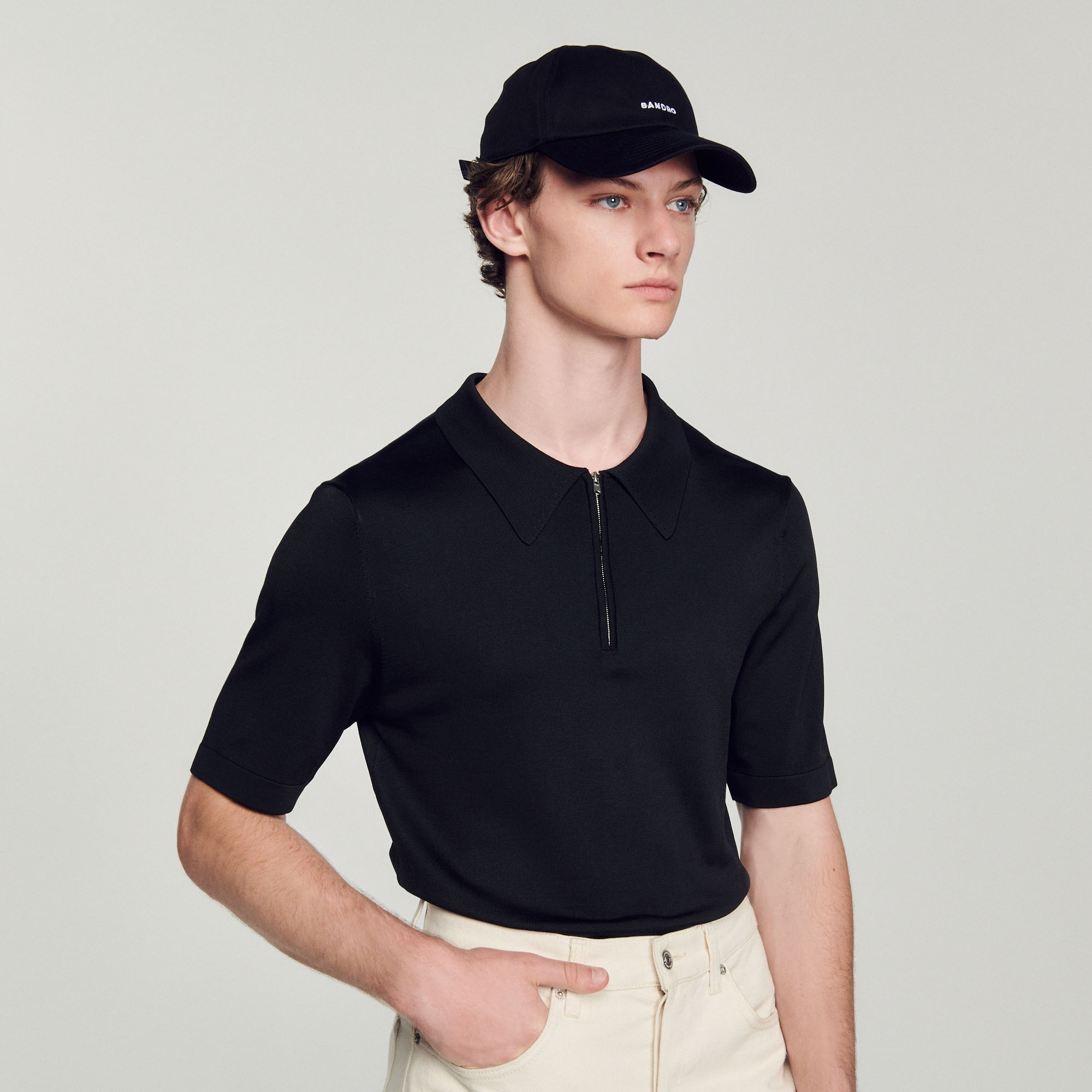 Polo en maille á col zippe