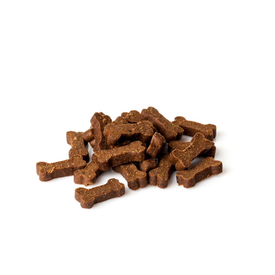 Petiscos de porco ibérico da Moments para cães