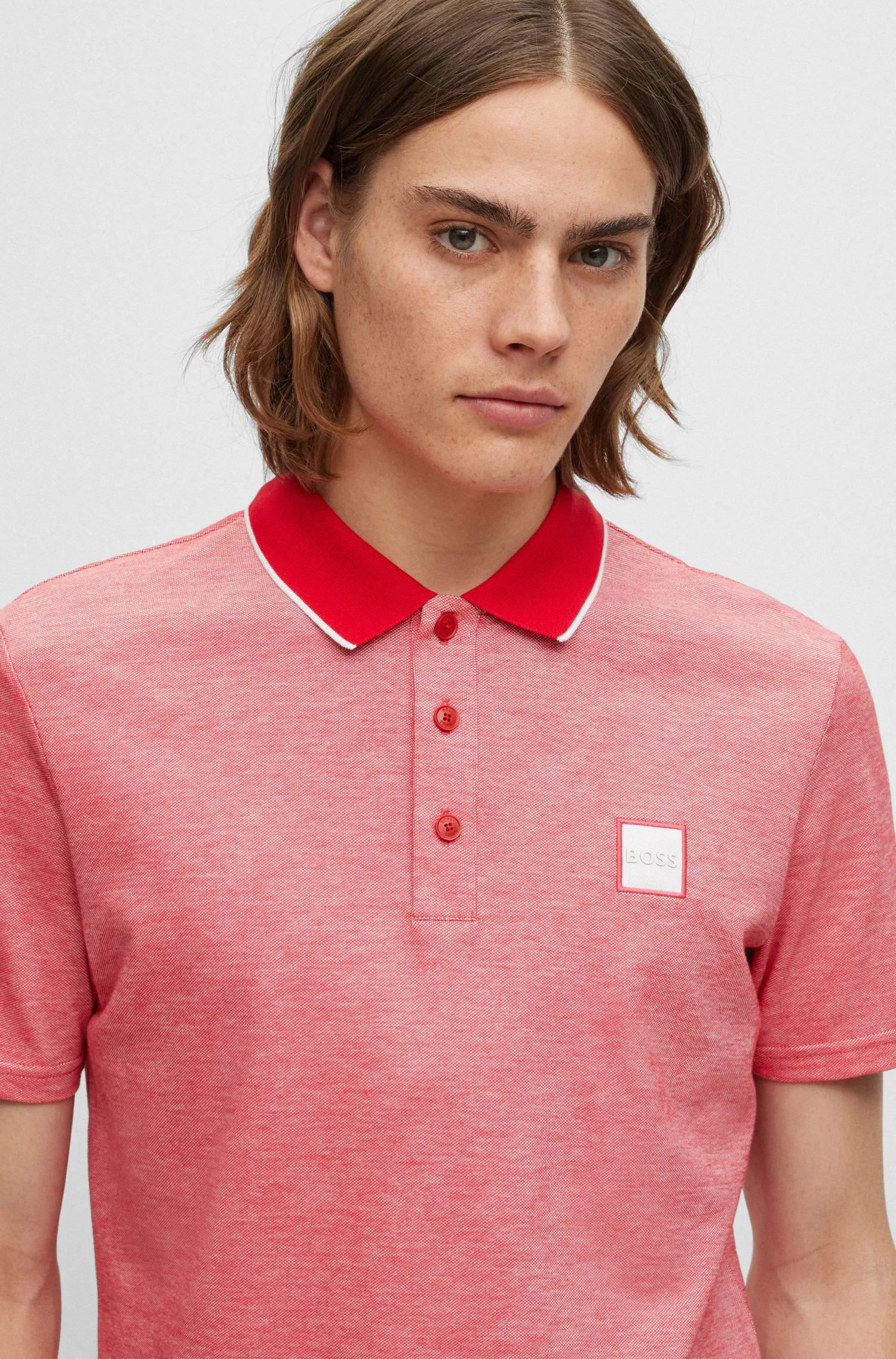 Camisa polo BOSS laranja em piqué de algodão com emblema da marca.