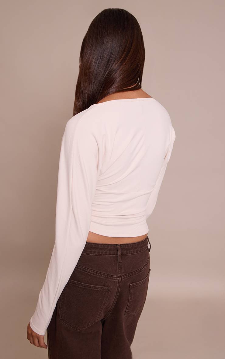 Crème Haut À Manches Longues Ultra Doux Avec Décolleté Plongeant Et Détails