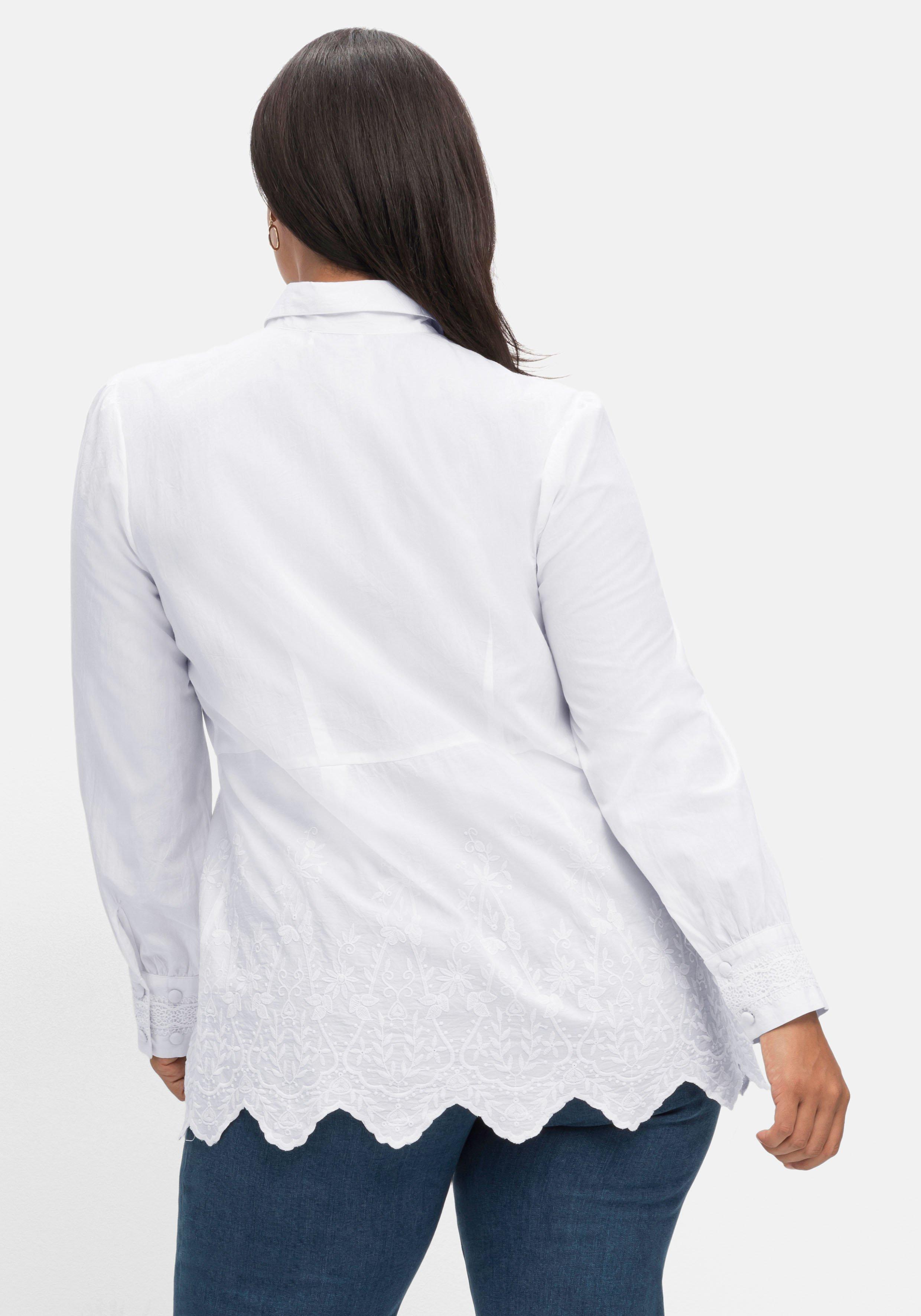 Bluse mit floralen Stickereien und Wellensaumkante