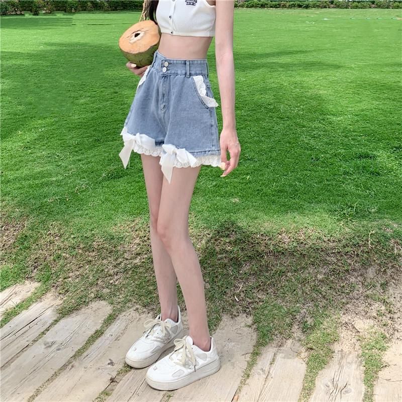 Hevnir - Hoge taille denim shorts met strik en kant