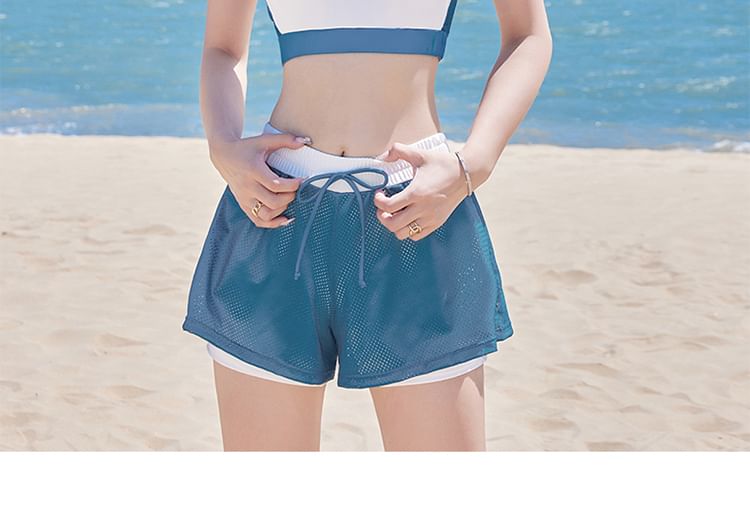 Sancus - Set: Tweekleurige crop tankinitop + zwemshort + korte mouwen met tekstopdruk