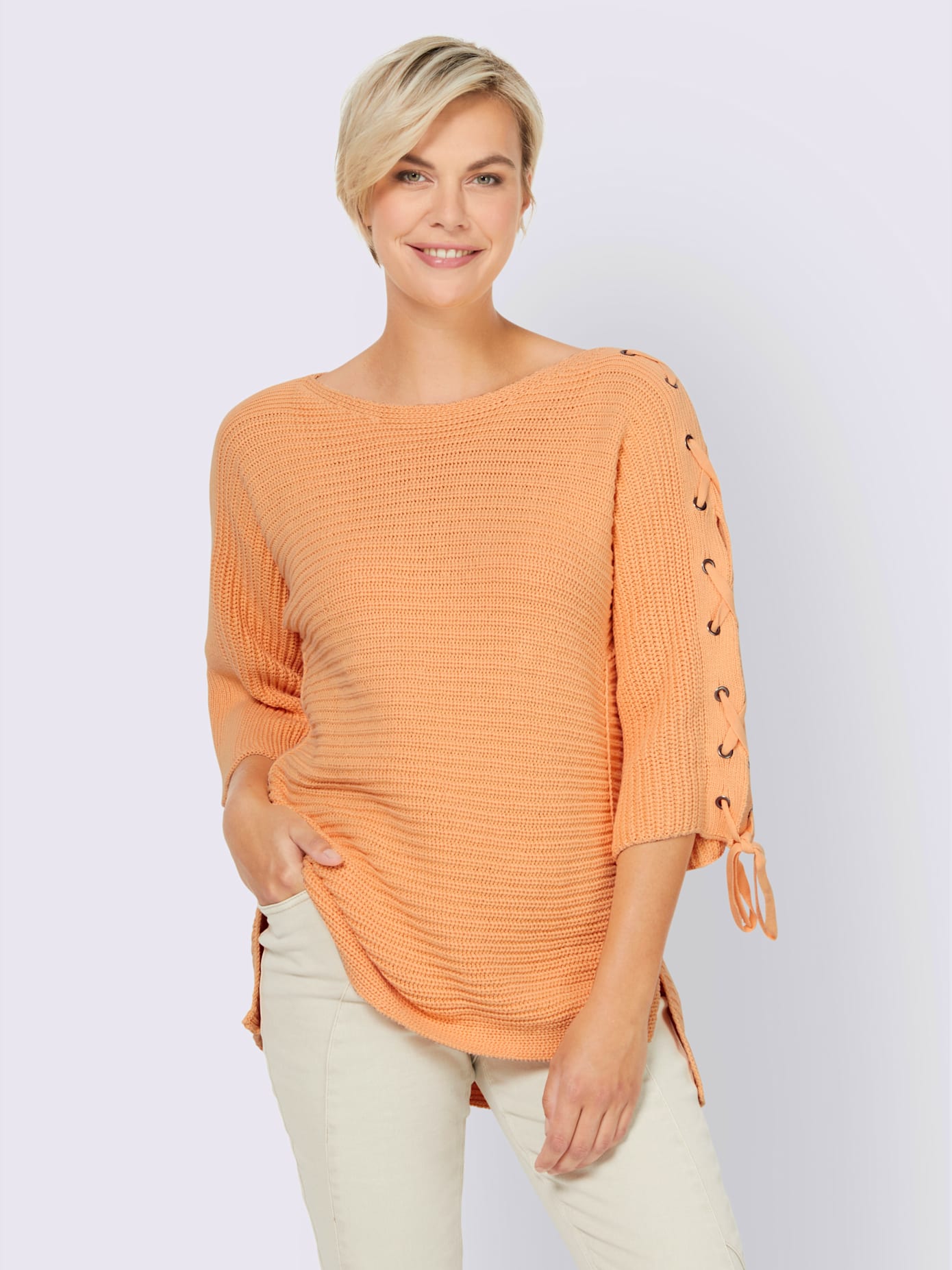Pull laçage mode aux manches