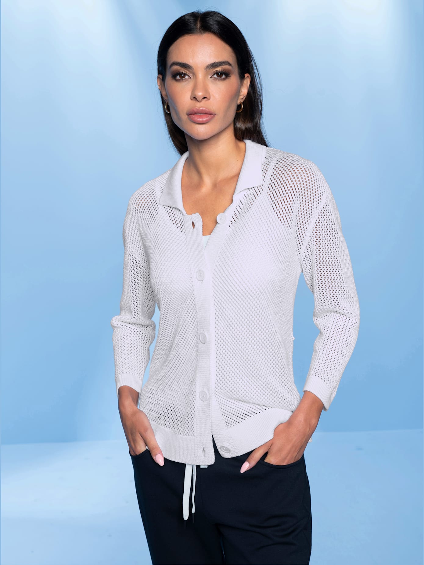 Veste en tricot motif ajouré transparent discret