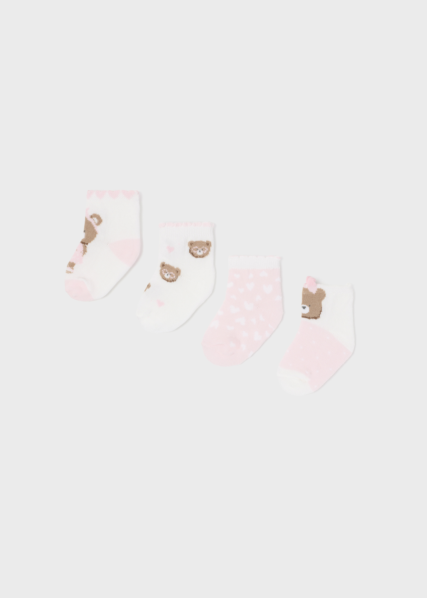 Pacote com 4 pares de meias de algodão orgânico para recém-nascidos.