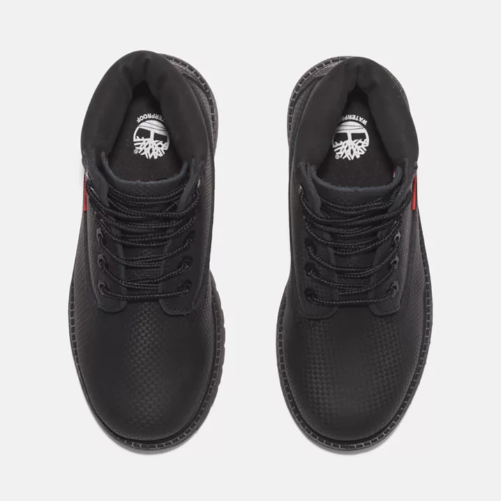 Bota Timberland Premium Helcor de 6 polegadas para jovens na cor preta.