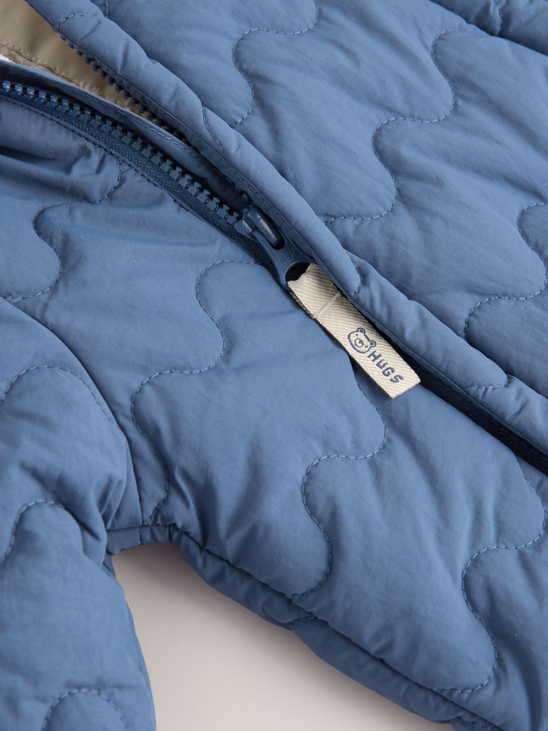 Marineblauw doorgestikt - Baby all-in-one van nylon met capuchon (0-18mnd)