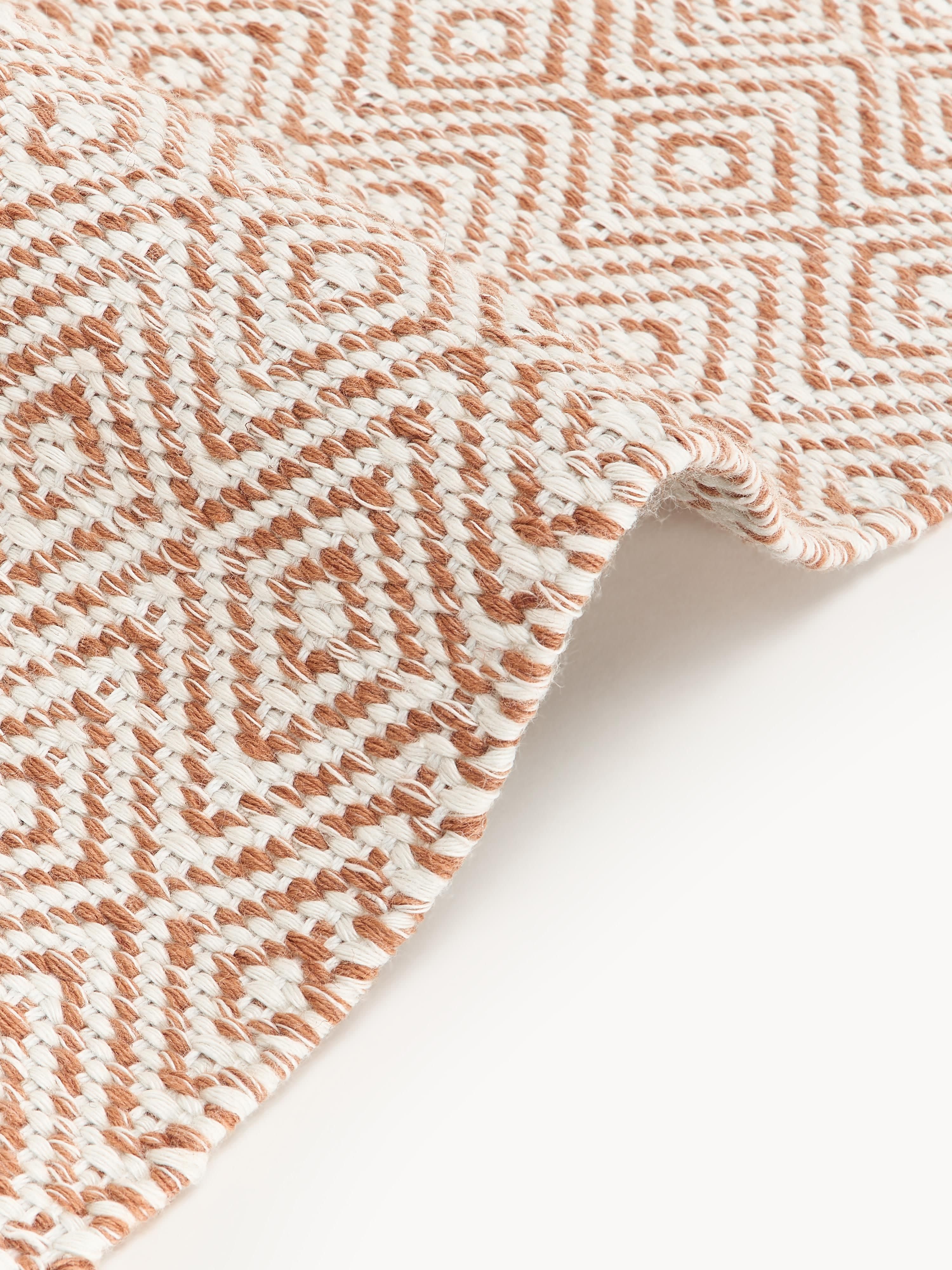Handgeweven outdoor vloerkleed Rika met vintage ruitjesmotief