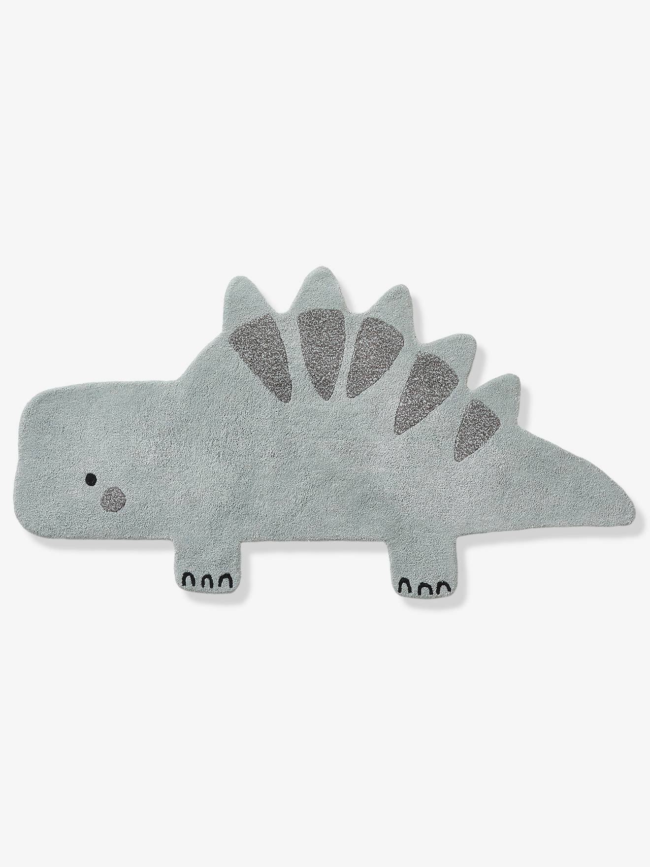 Tapete pequeno com estampa de dinossauro, verde médio, liso com motivos.