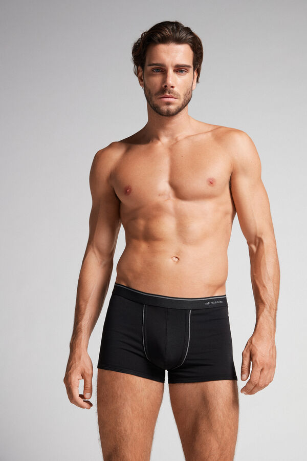 Cuecas boxer em algodão Supima® com elástico visível.